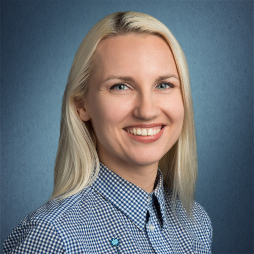 headshot of Alina with dark blue background