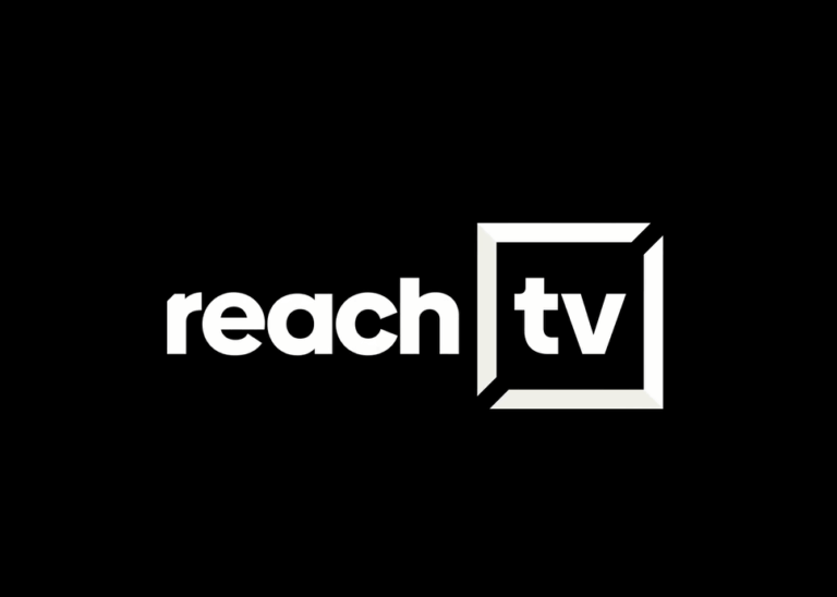 The reach TV logo in white on a black blackground